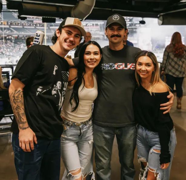 Group of fans posing together at Hondo Rodeo Fest