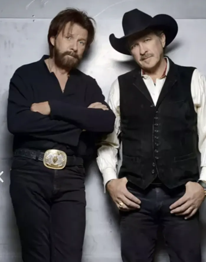 Two country musicians in western wear